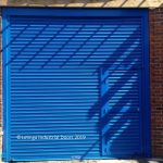 Shutter in Blue with Wicket Gate Roller Shutter Garage Doors